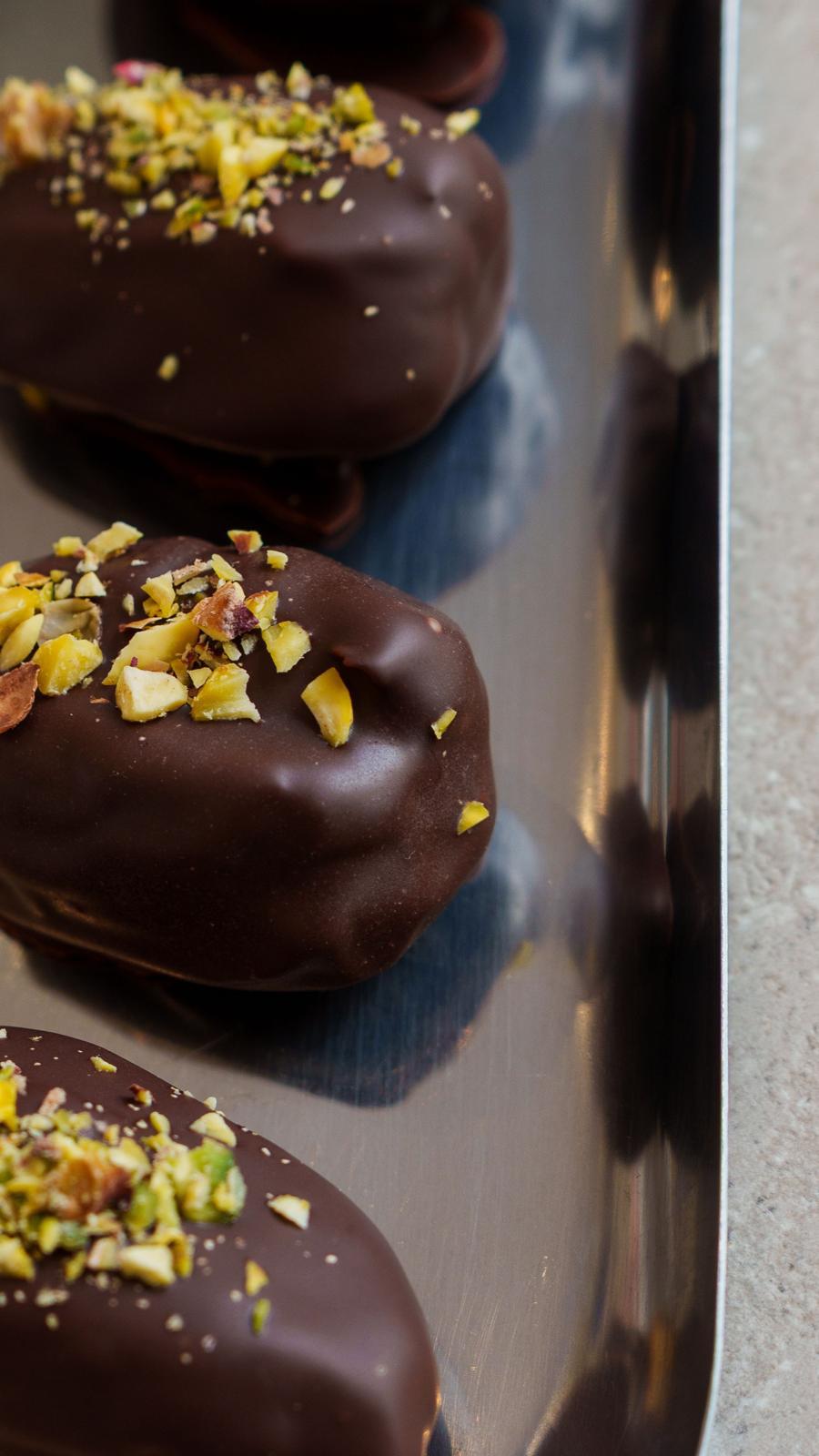 Chocolate-dipped dates with pistachio